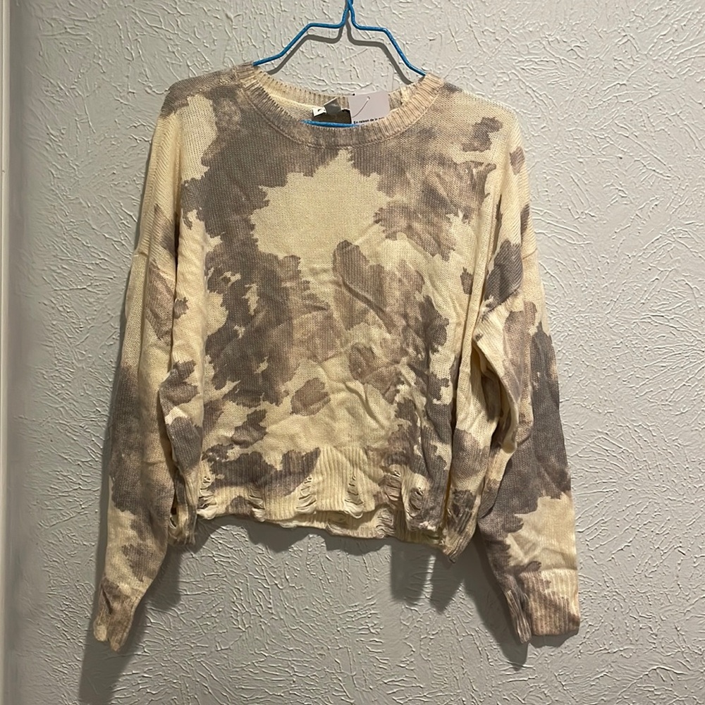 Frayed sweater